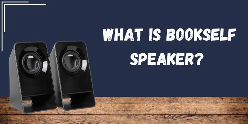 What is a Bookshelf Speaker In this image, a text is written on a dark background saying "What is a Bookshelf Speaker," and below, there are speakers placed on wood, with a border at the top corner.